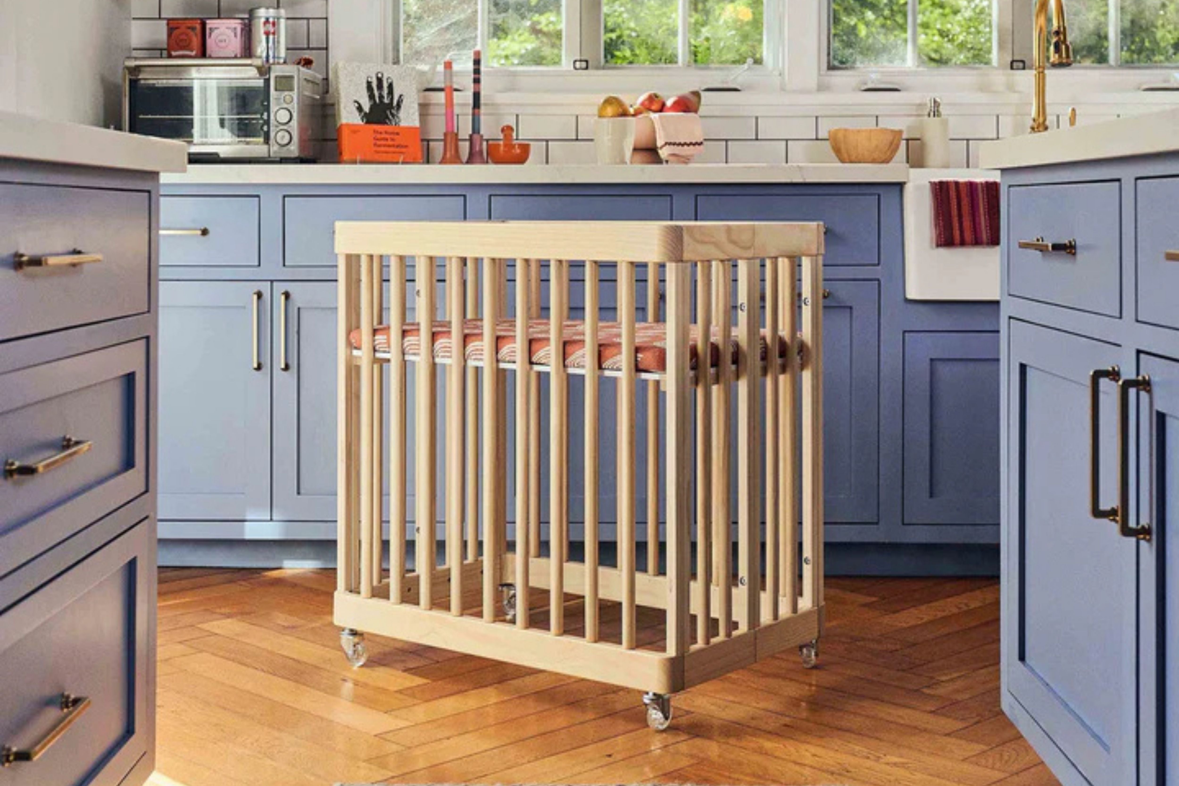 Babyletto blonde pogo 8-in-1-convertible crib bassinet in a kitchen#color_blonde