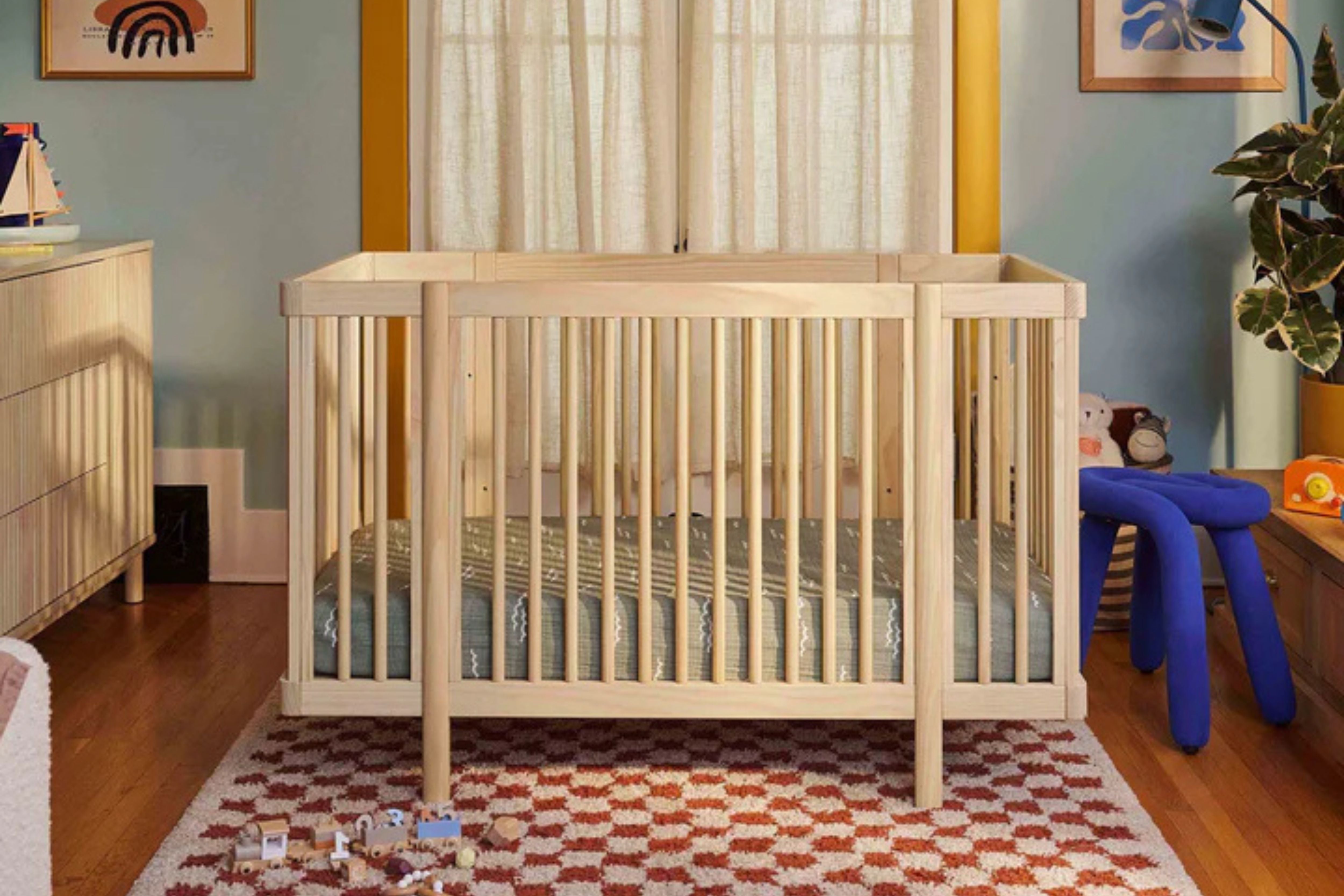 Babyletto blonde pogo 8-in-1-convertible crib full size crib in a nursery#color_blonde