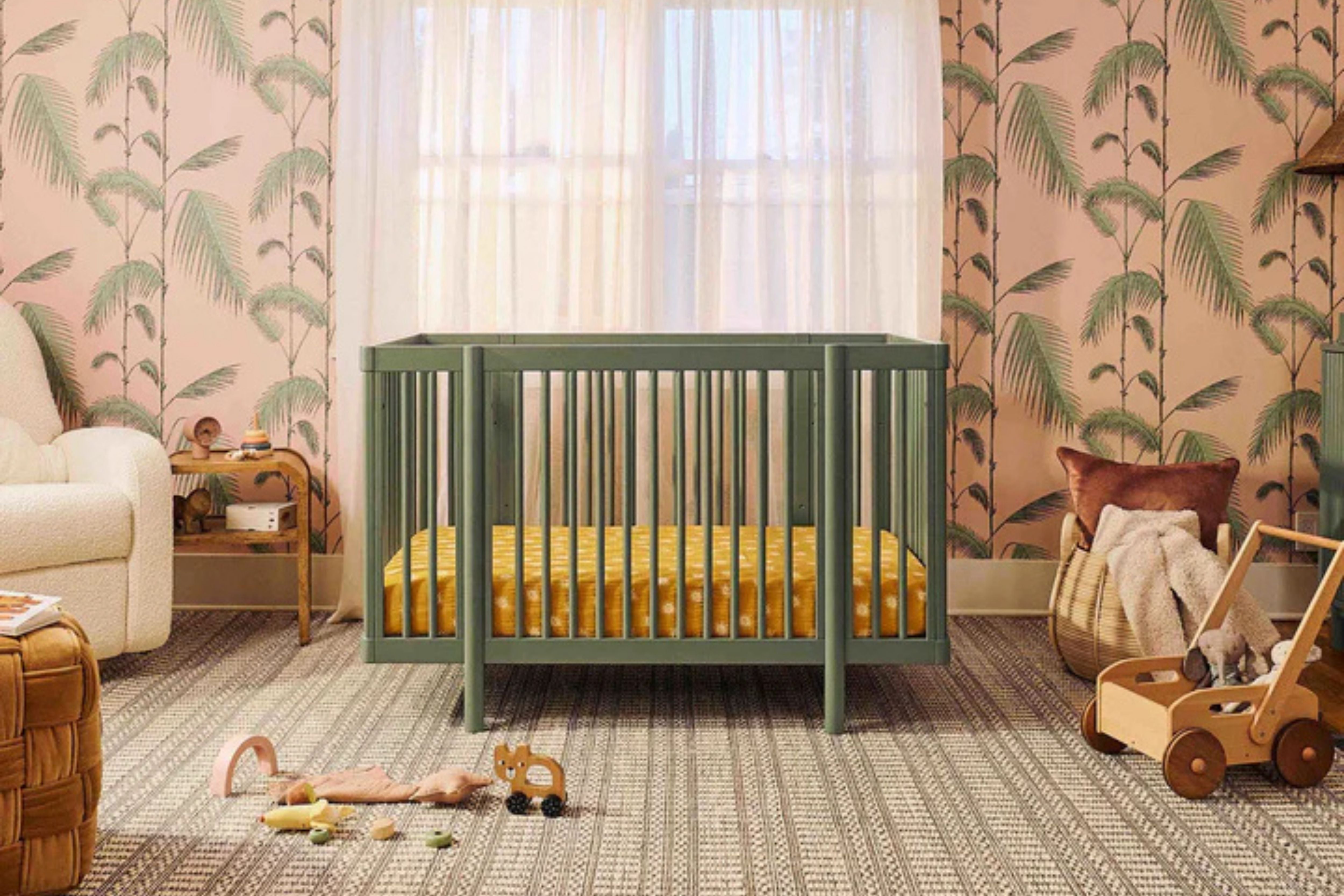 Babyletto olive pogo 8-in-1-convertible crib full size crib displayed in the middle of a nursery#color_olive