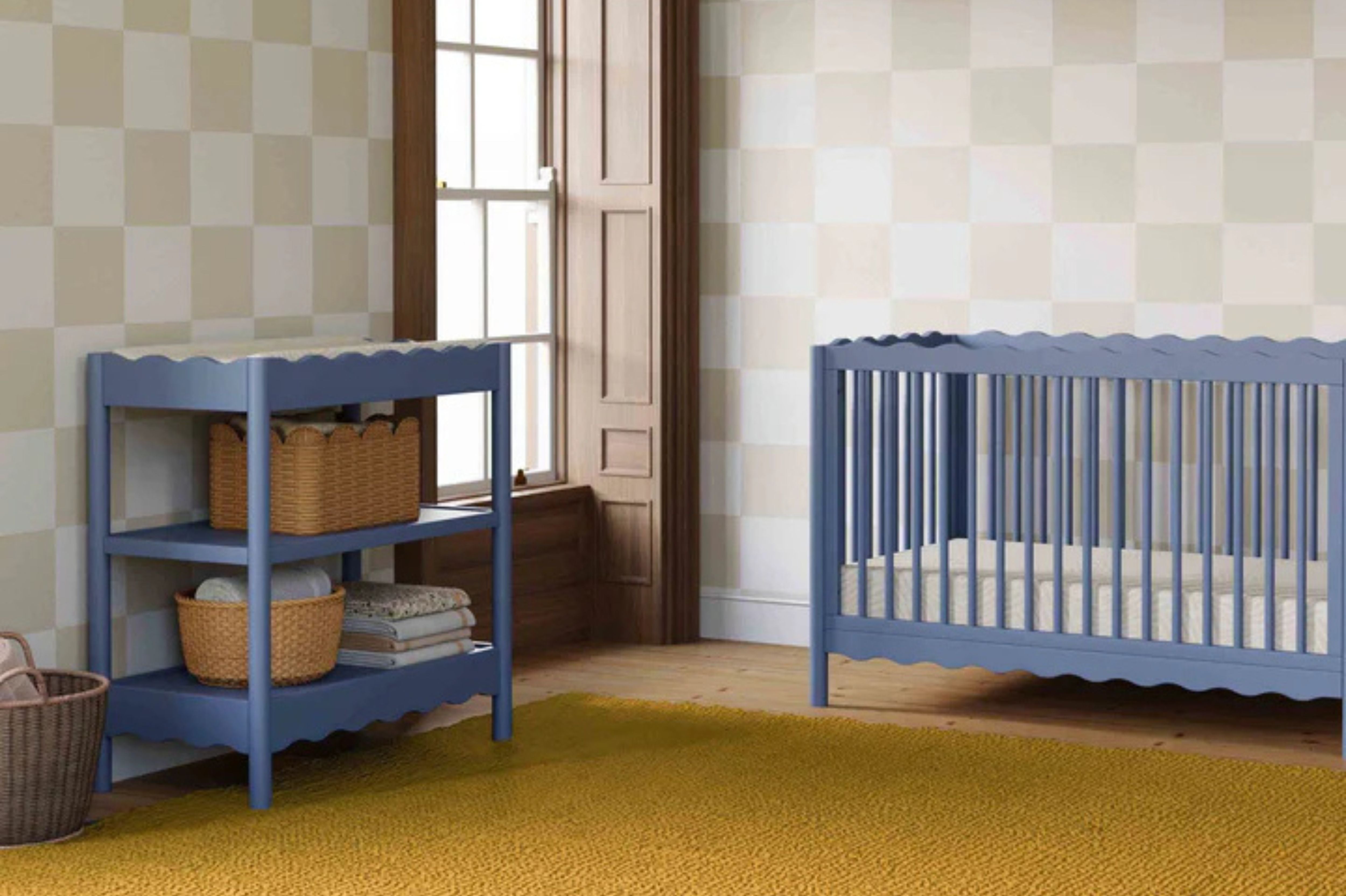 Babyletto swell changing table cove blue paired with the matching swell convertible crib in the nursery#color_cove-blue