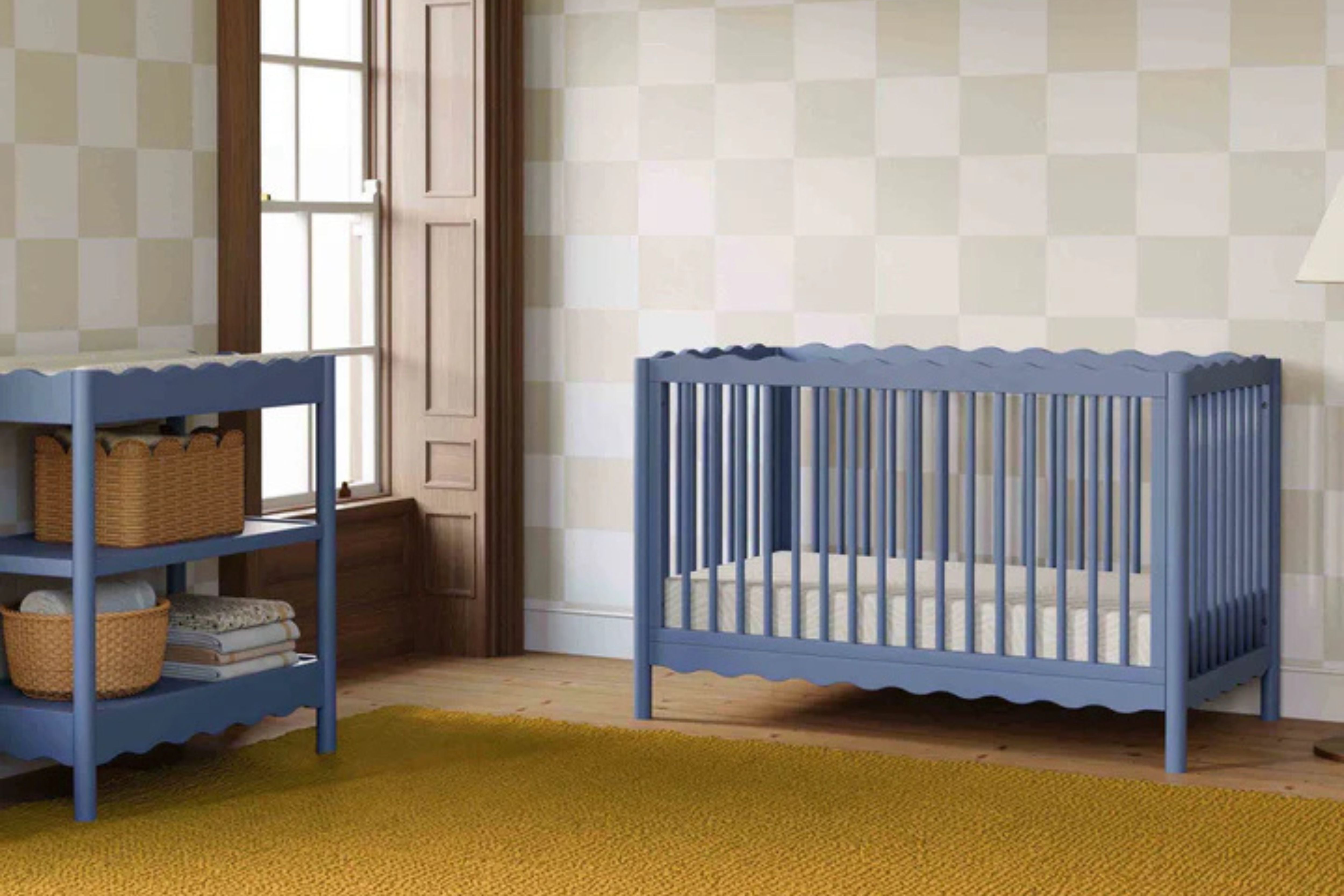 babyletto swell convertible crib cove blue in the nursery with the matching swell changing table#color_cove-blue