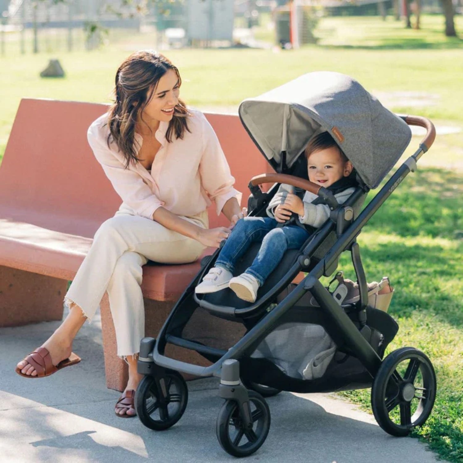 Mum bringing her toddler out to the park in the UPPAbaby VISTA V3 Stroller 