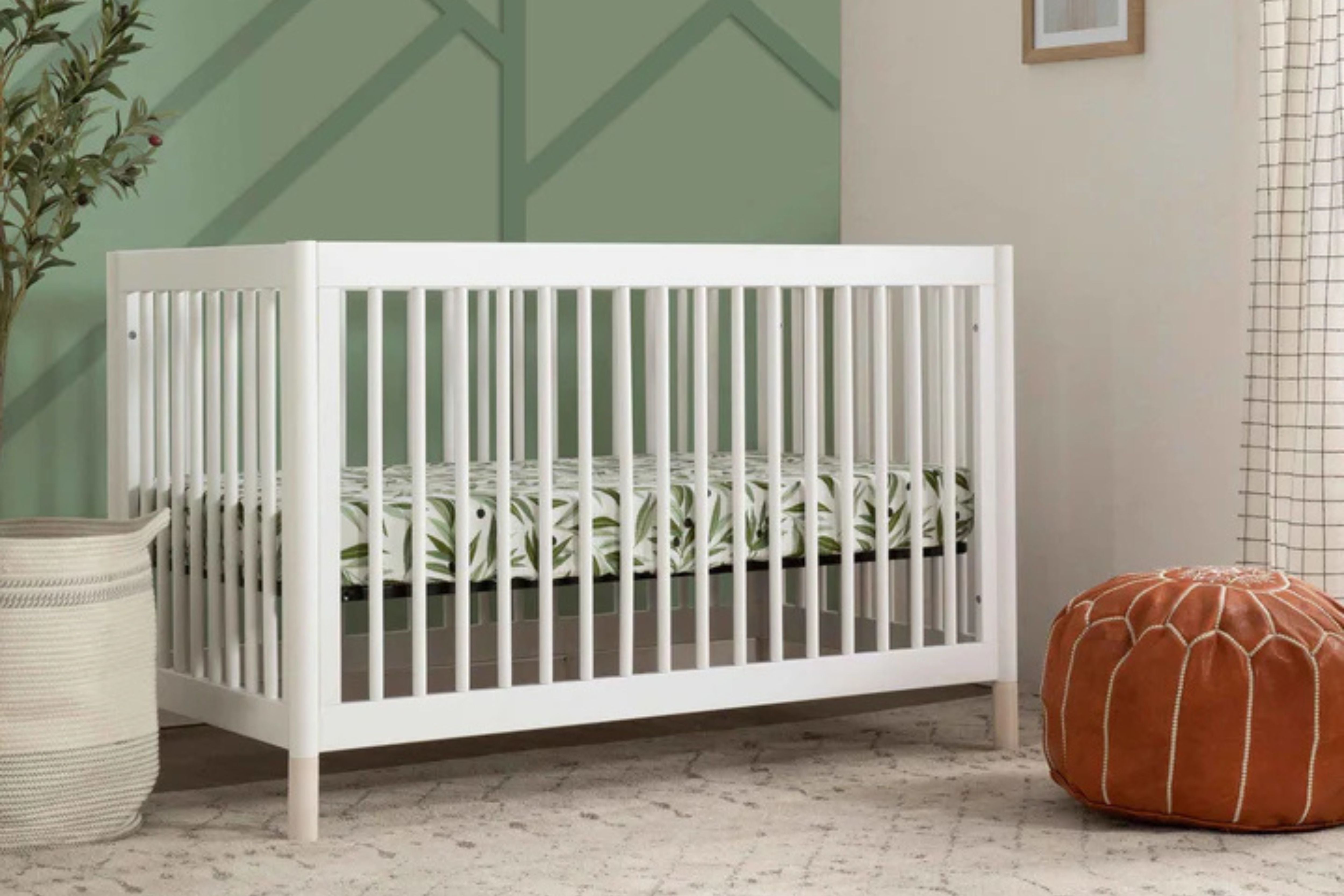 Babyletto gelato crib white in the corner of the nursery#color_white