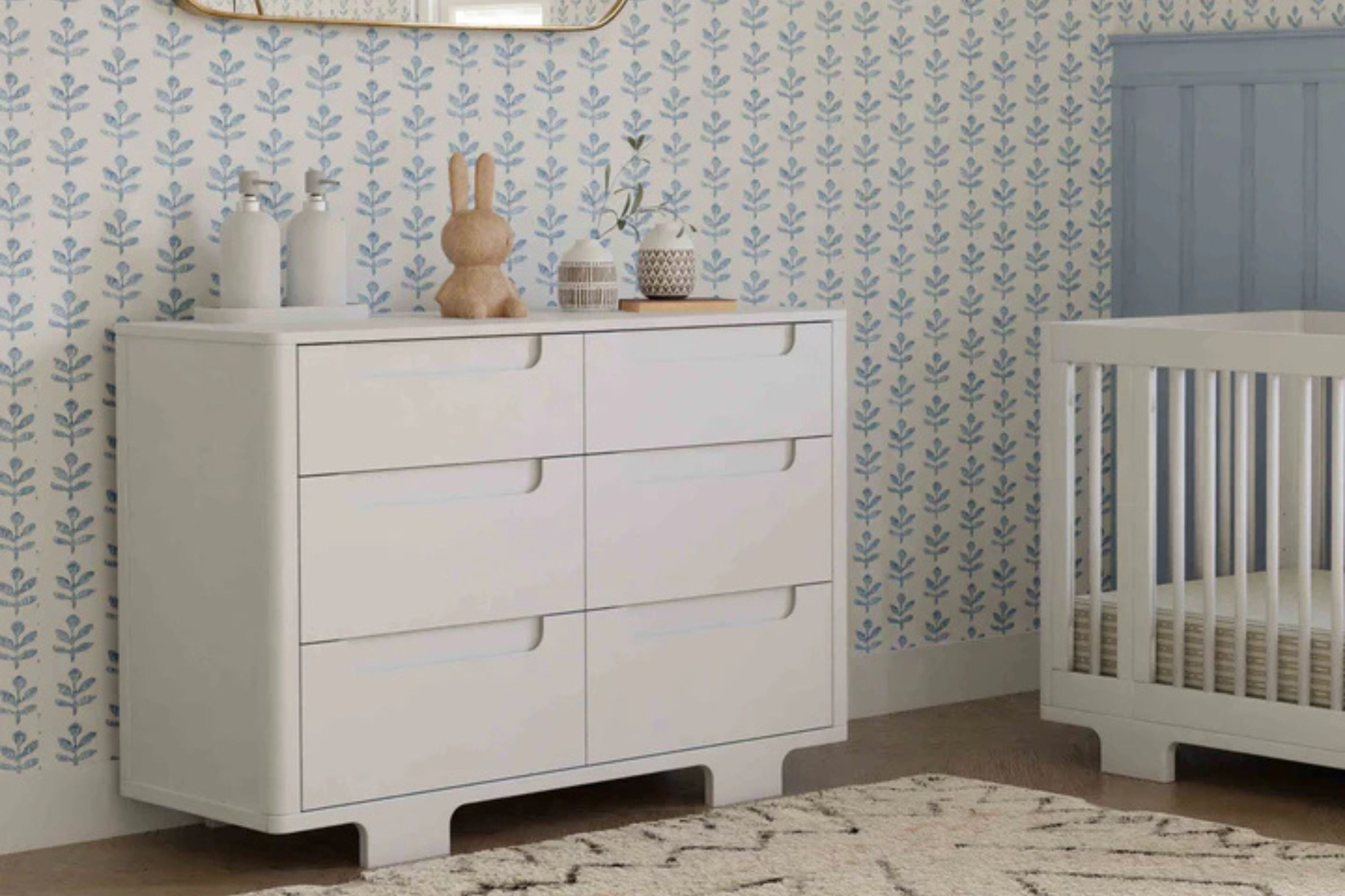 Babyletto Yuzu 6-Drawer Dresser White displayed in a nursery#color_white