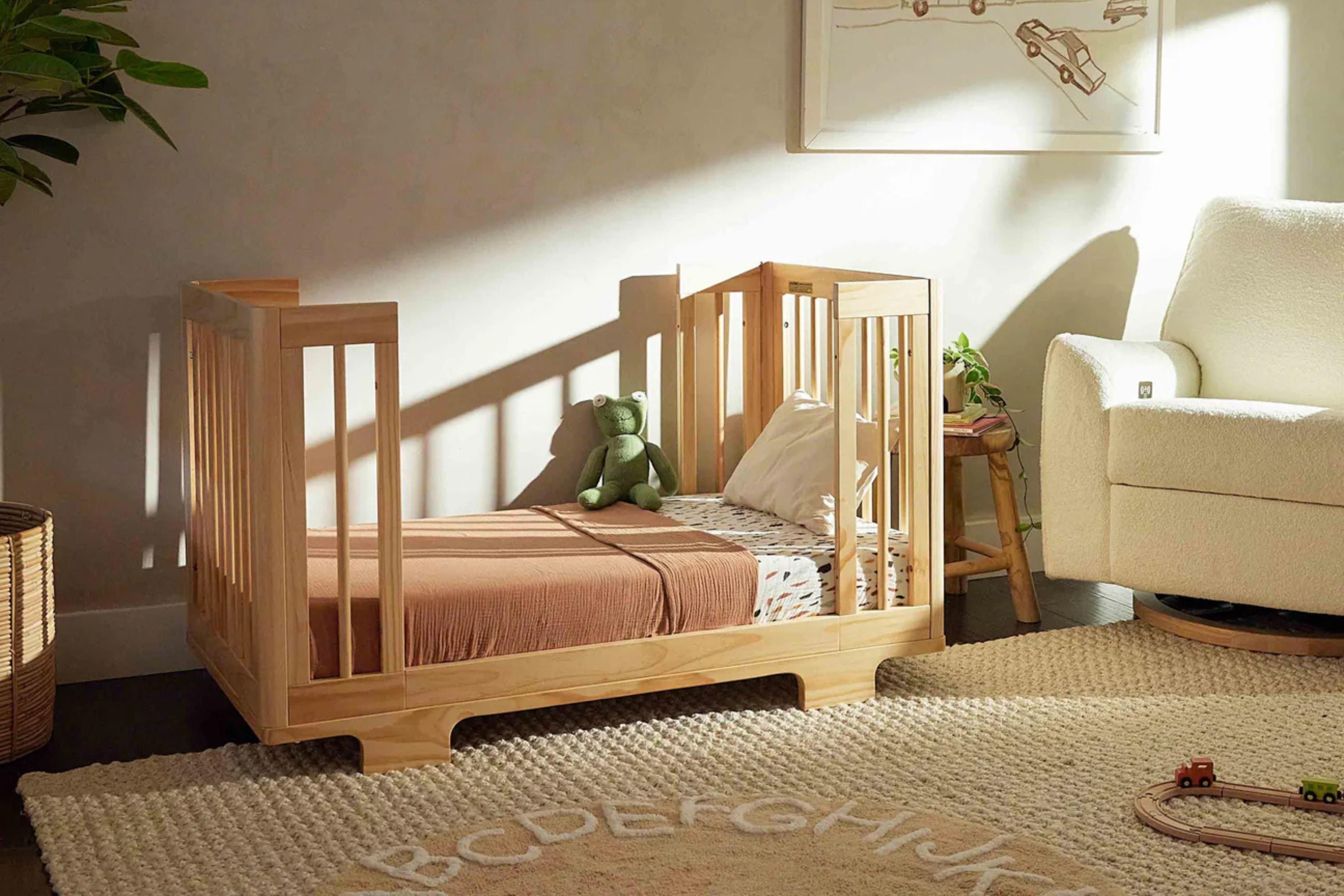 Babyletto Yuzu 8-in-1 Convertible Crib Natural junior bed configuration in a nursery #color_natural