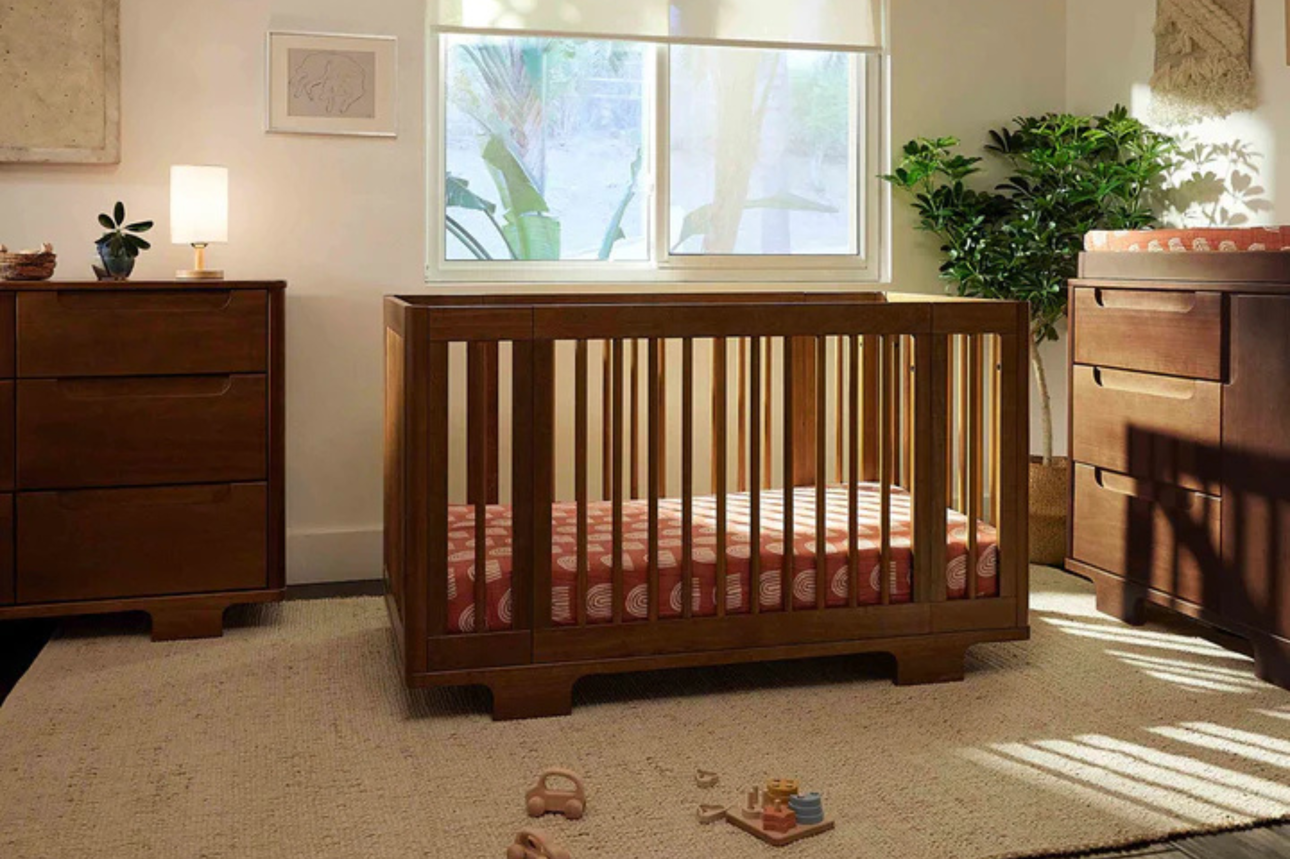 Babyletto Yuzu 8-in-1 Convertible Crib Walnut full size crib in a nursery#color_walnut