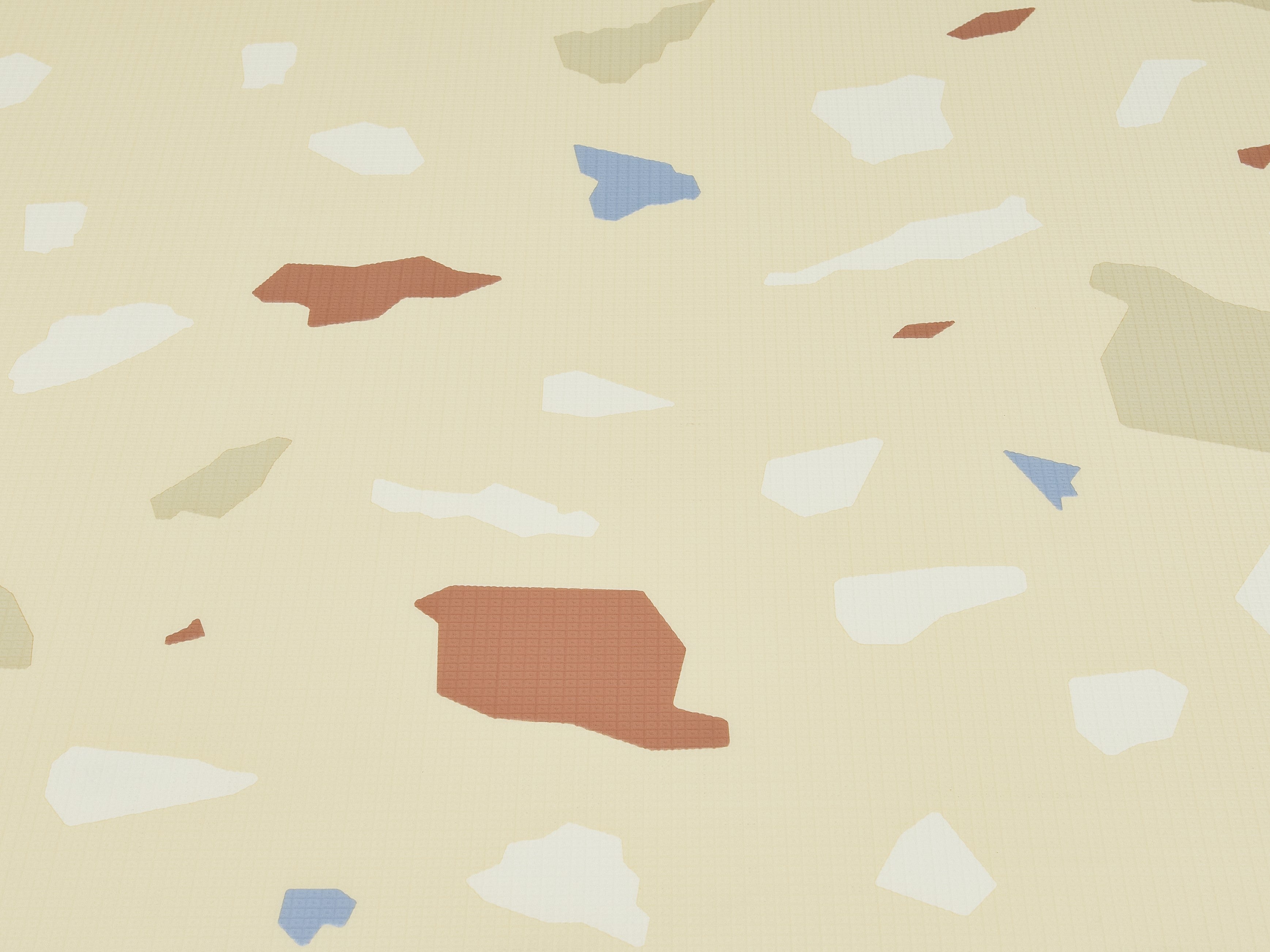 close up of lollibly terrazzo playmat print