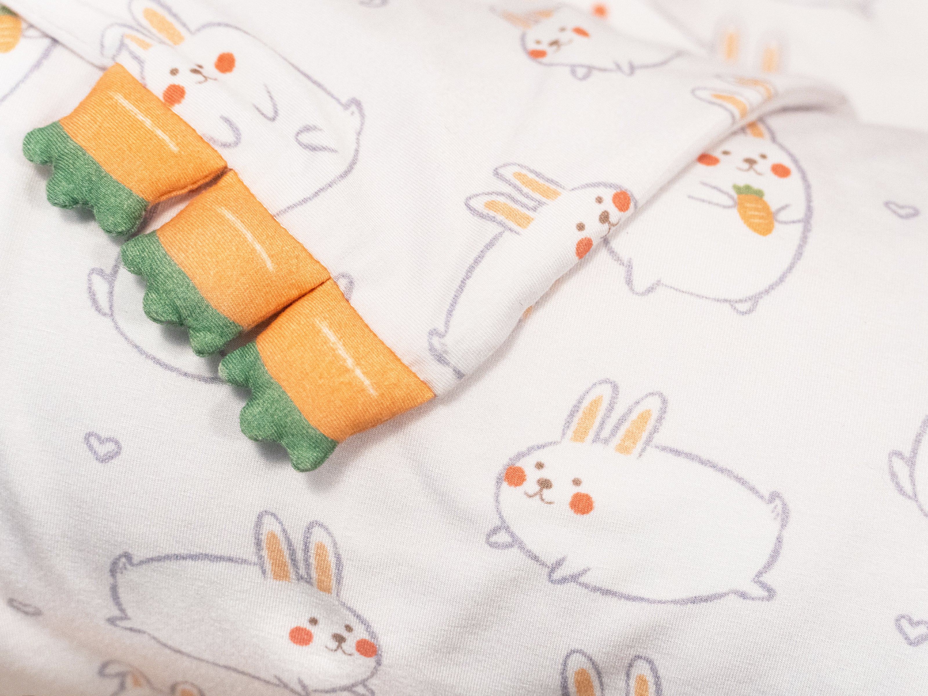 close up on cho momo bunny pillow carrot buntings